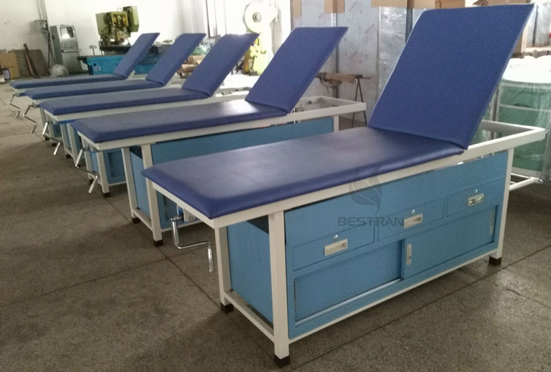 Examination table with drawers